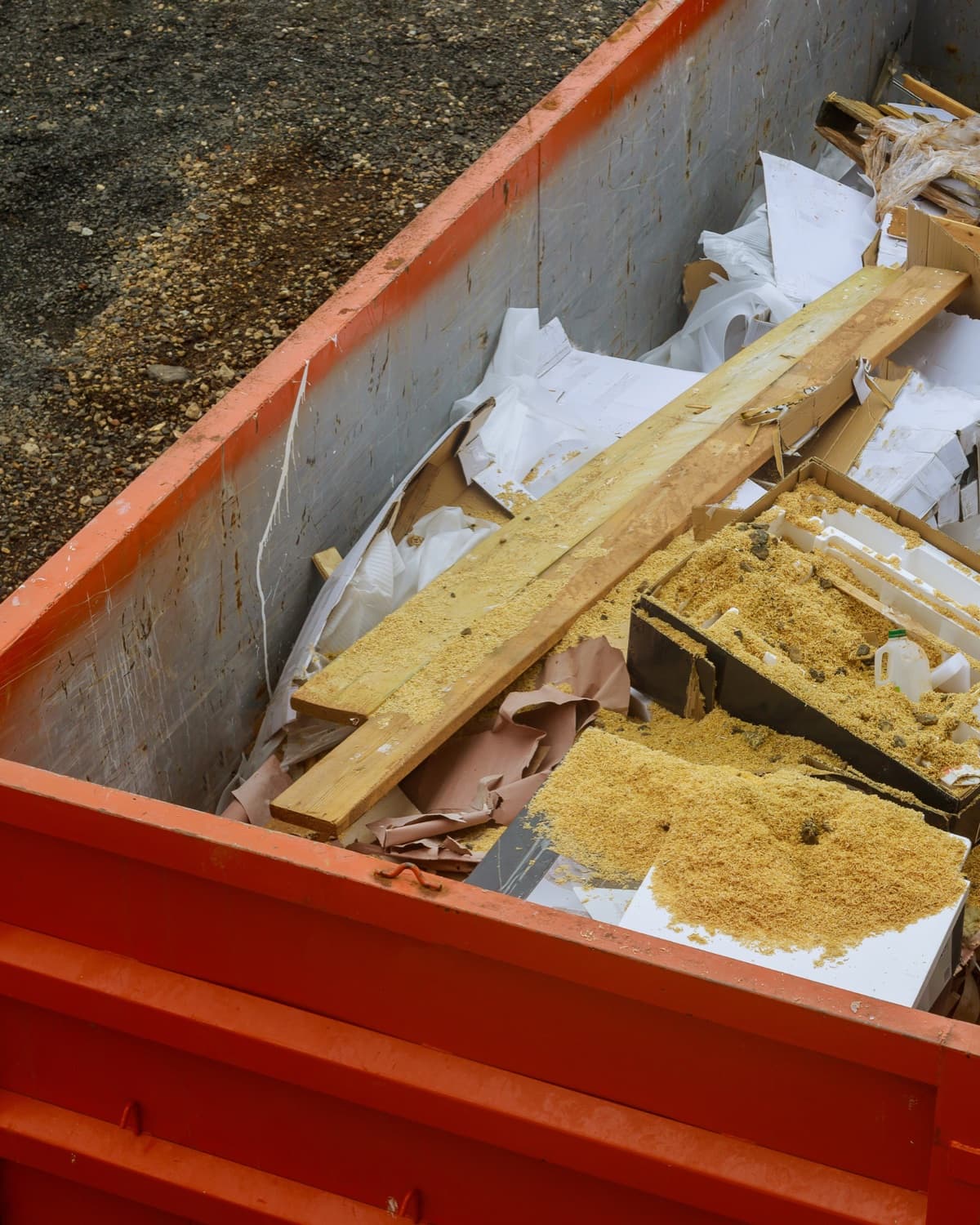 Roll-off dumpster filled with construction debris